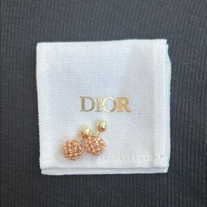 Dior faux pearl stud earrings.